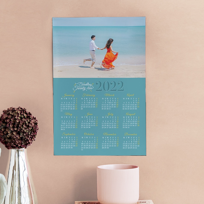 If you find a space crunch on your table or have an unusually cluttered desk then opt for our Poster Calendar. This one is 12”x18” tall and can display upto 4 pictures!